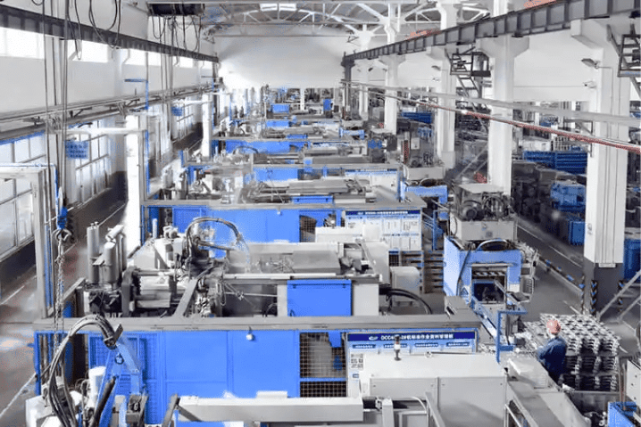 Industrial machinery in large manufacturing facility.