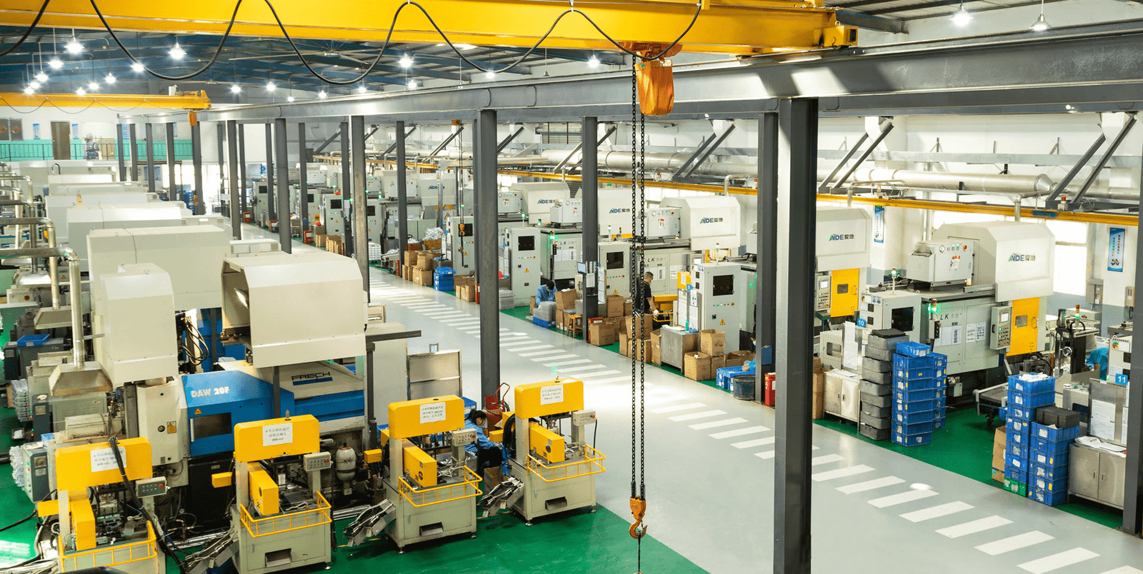 Busy industrial manufacturing factory with machinery